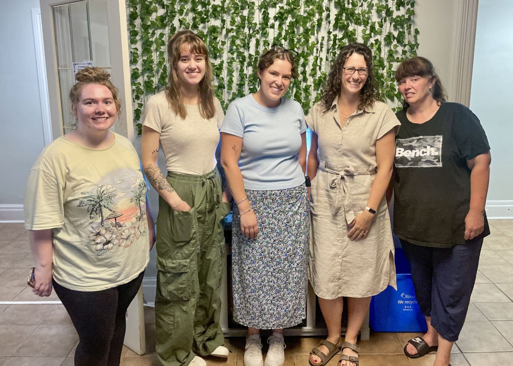 Five St. Joseph Women's Centre staff members standing for a picture.